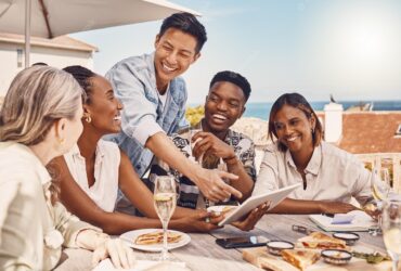 friends-employees-casual-workers-lunch-meeting-restaurant-planning-with-5g-tablet-talking-about-marketing-strategy-while-eating-food-cafe-happy-people-streaming-funny-videos_590464-81230